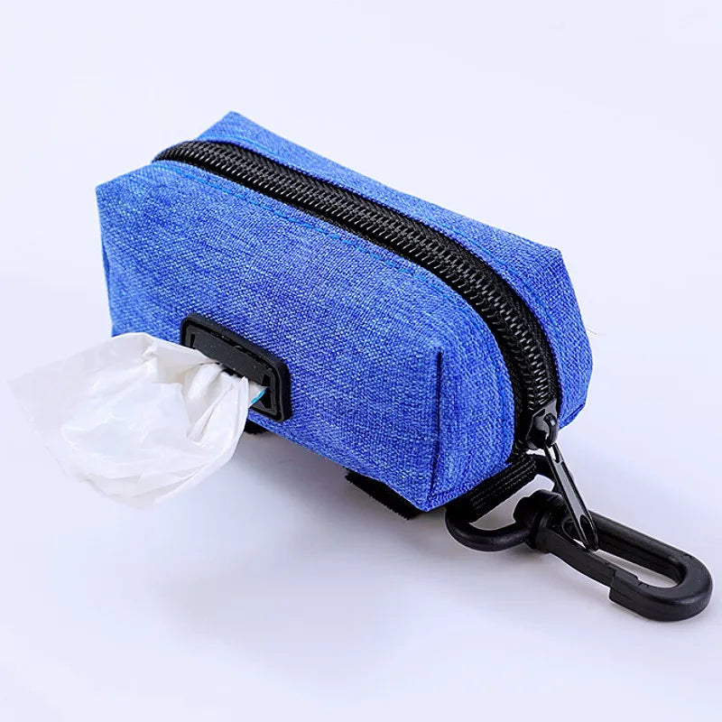 Blue dog waste bag dispenser pouch with zipper and clip for leash or belt attachment