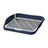 Dog potty training tray with blue base and removable mesh grid on white background