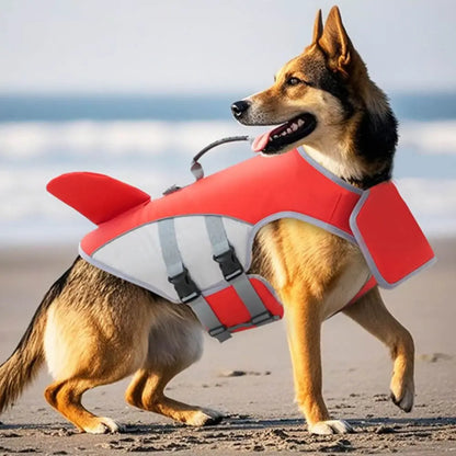 dog life jacket for beach and water safety, red adjustable vest with quick-release buckle and back traction hook