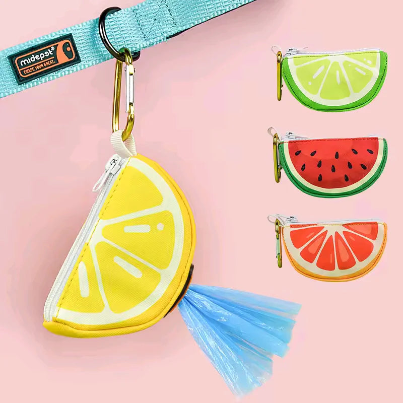 Lemon-shaped dog poop bag holder dispenser attached to leash with colorful fruit designs