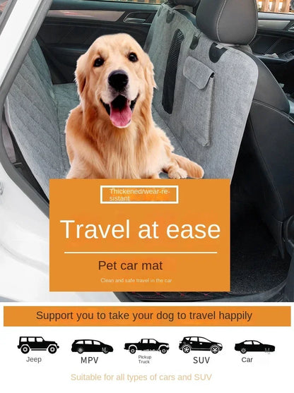 golden retriever on a waterproof dog car seat cover in a vehicle back seat for safe pet travel