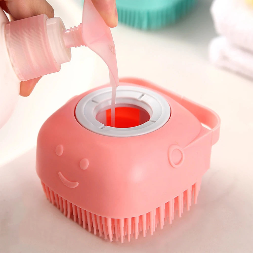 Pink silicone pet bathing brush with shampoo dispenser for dog and cat grooming, soft massage comb for bathing
