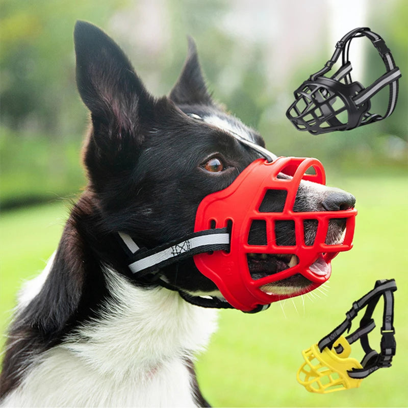 Dog wearing a red basket muzzle outdoors with black and yellow muzzle options shown