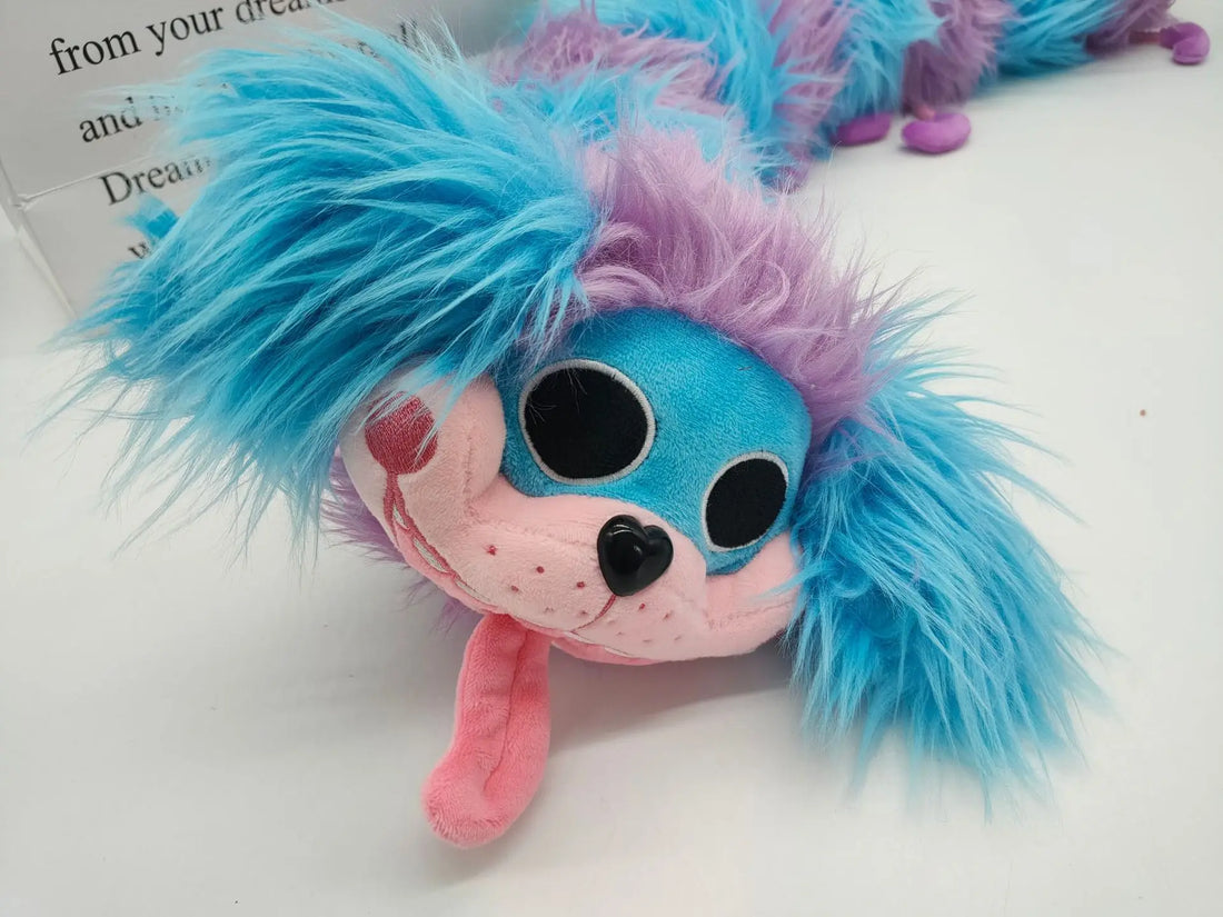 Cute caterpillar plush toy for kids with vibrant blue and purple fur and playful facial features.