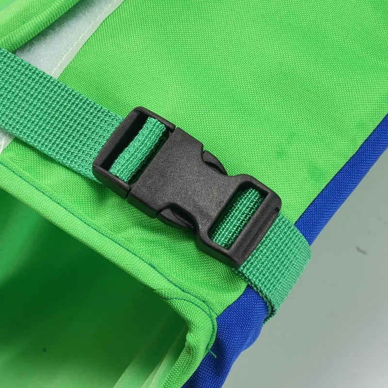 Green dog life jacket with adjustable buckle strap and durable waterproof safety vest design for swimming
