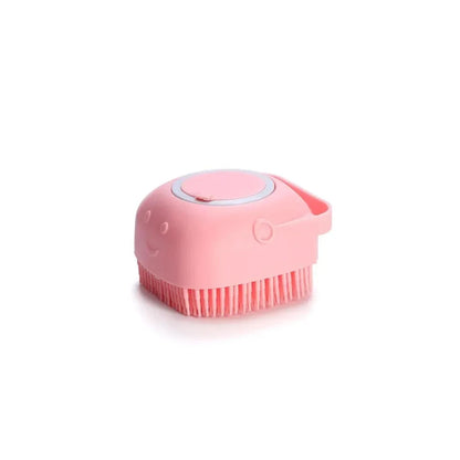 Pink silicone pet bathing brush with shampoo dispenser for dog and cat grooming, soft massage bristles
