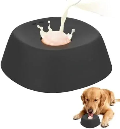 Black slow feeder dog bowl with non-slip base for bone broth, yogurt, and liquid treats, with dog licking the bowl