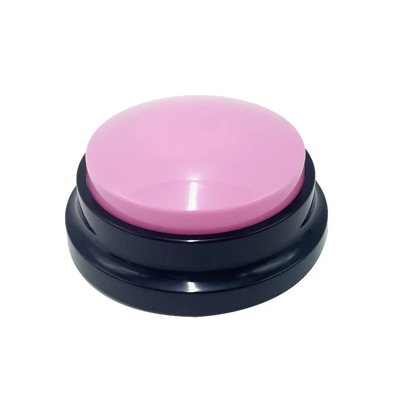 Pink dog training button with black base for interactive pet communication