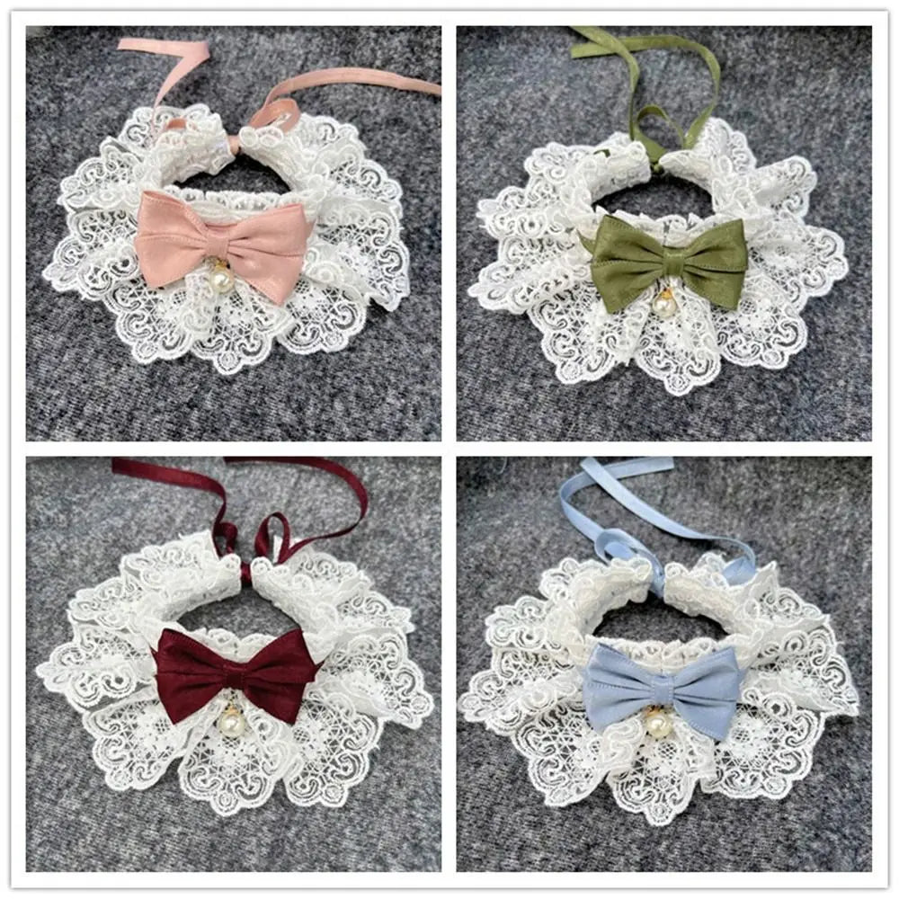Set of four lace dog collars with bows in pink, green, burgundy, and blue on gray background.