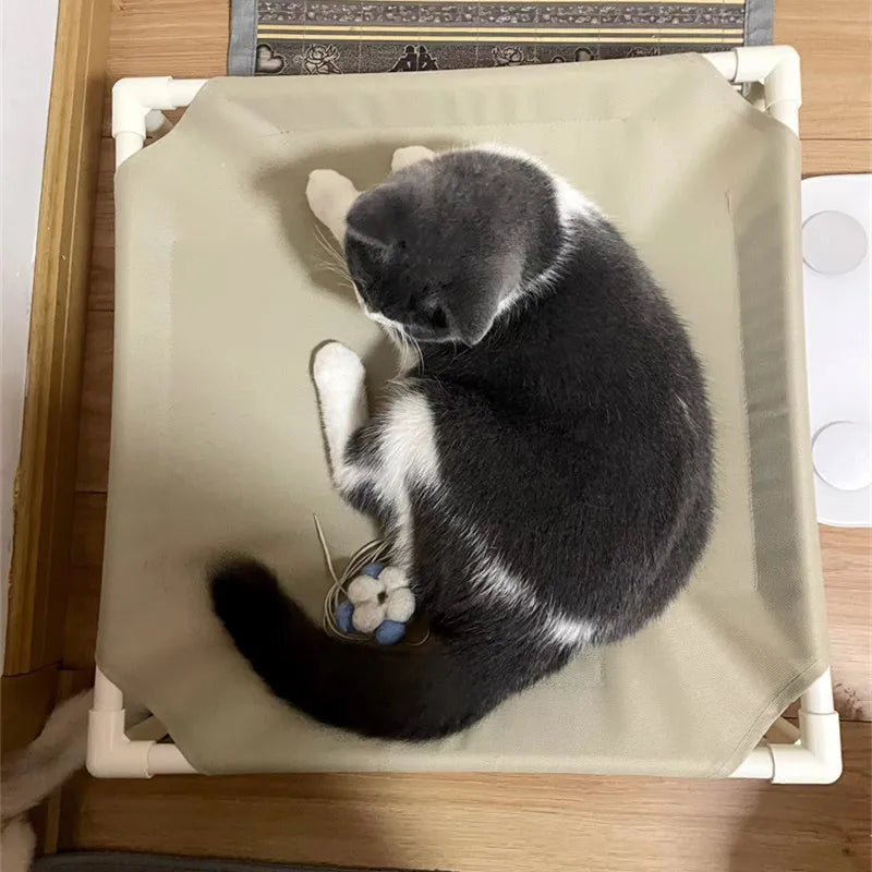 Elevated dog camping bed for cats and small dogs, portable foldable nylon pet hammock with washable removable cover