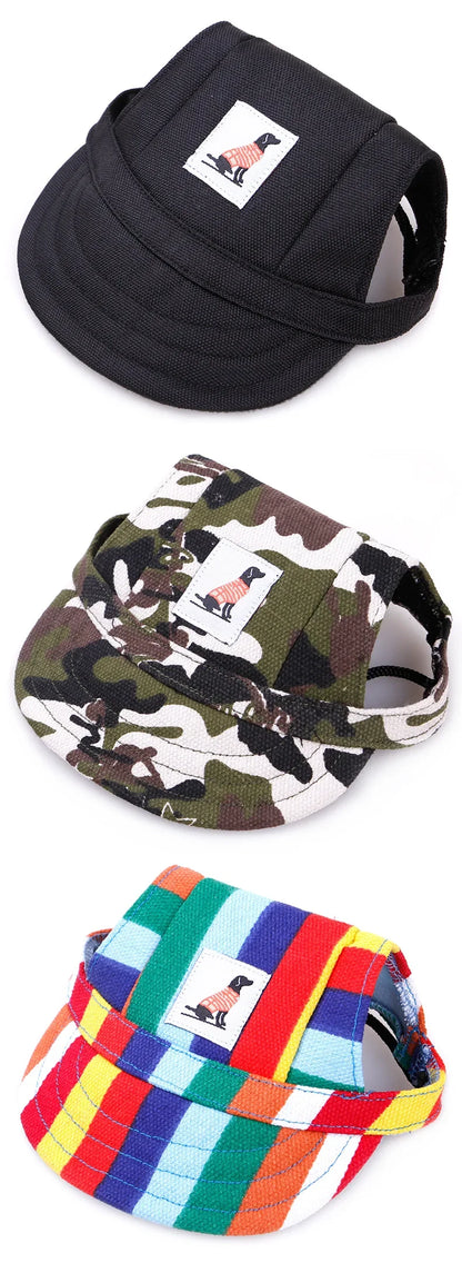 Three dog hats in black, camouflage, and rainbow stripe designs featuring a dog patch.