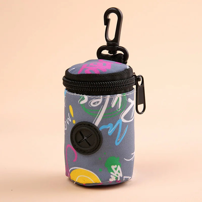 Colorful dog poop bag holder with zipper and clip, abstract print on gray background