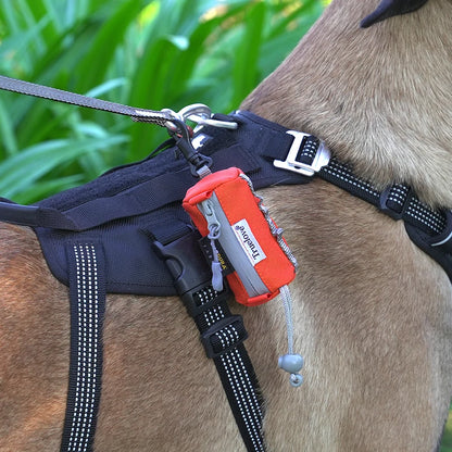 dog poop bag holder with carabiner attached to a dog harness for hands-free leash walking