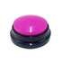 Pink dog training button toy with black base on white background