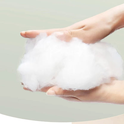 foldable washable cat bed, soft fluffy fill held in hands for cozy, breathable pet comfort