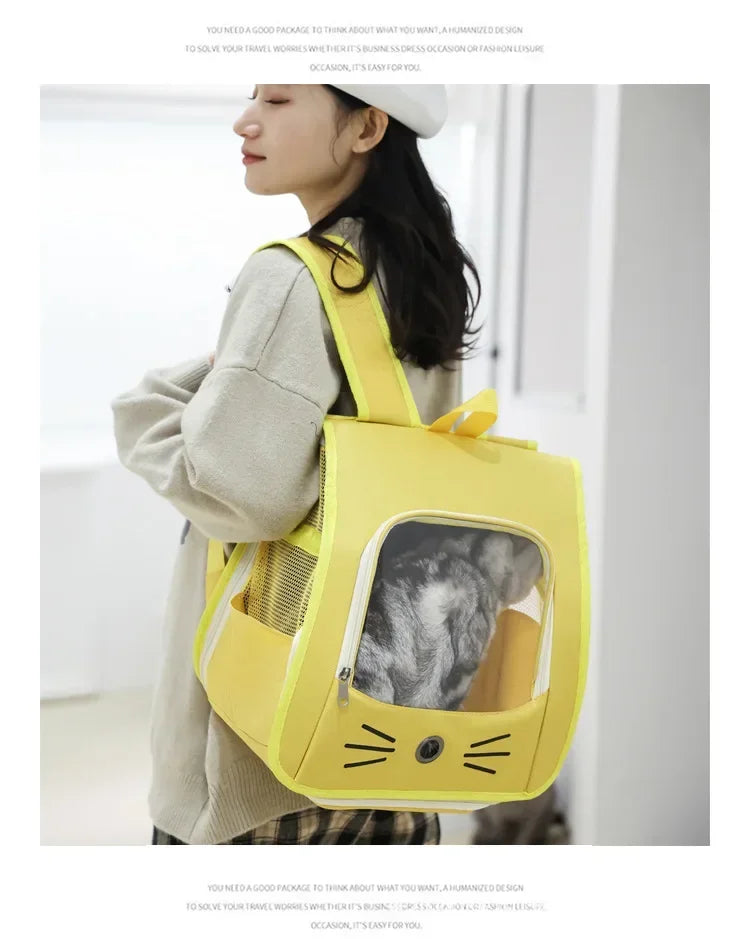 Yellow breathable pet carrier backpack for cats and small dogs, portable shoulder carrier with zipper window