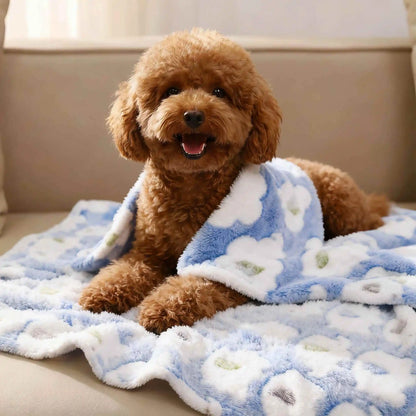 soft dog blanket on a cozy fluffy pet bed mat with a cute dog wrapped in a plush reversible blanket