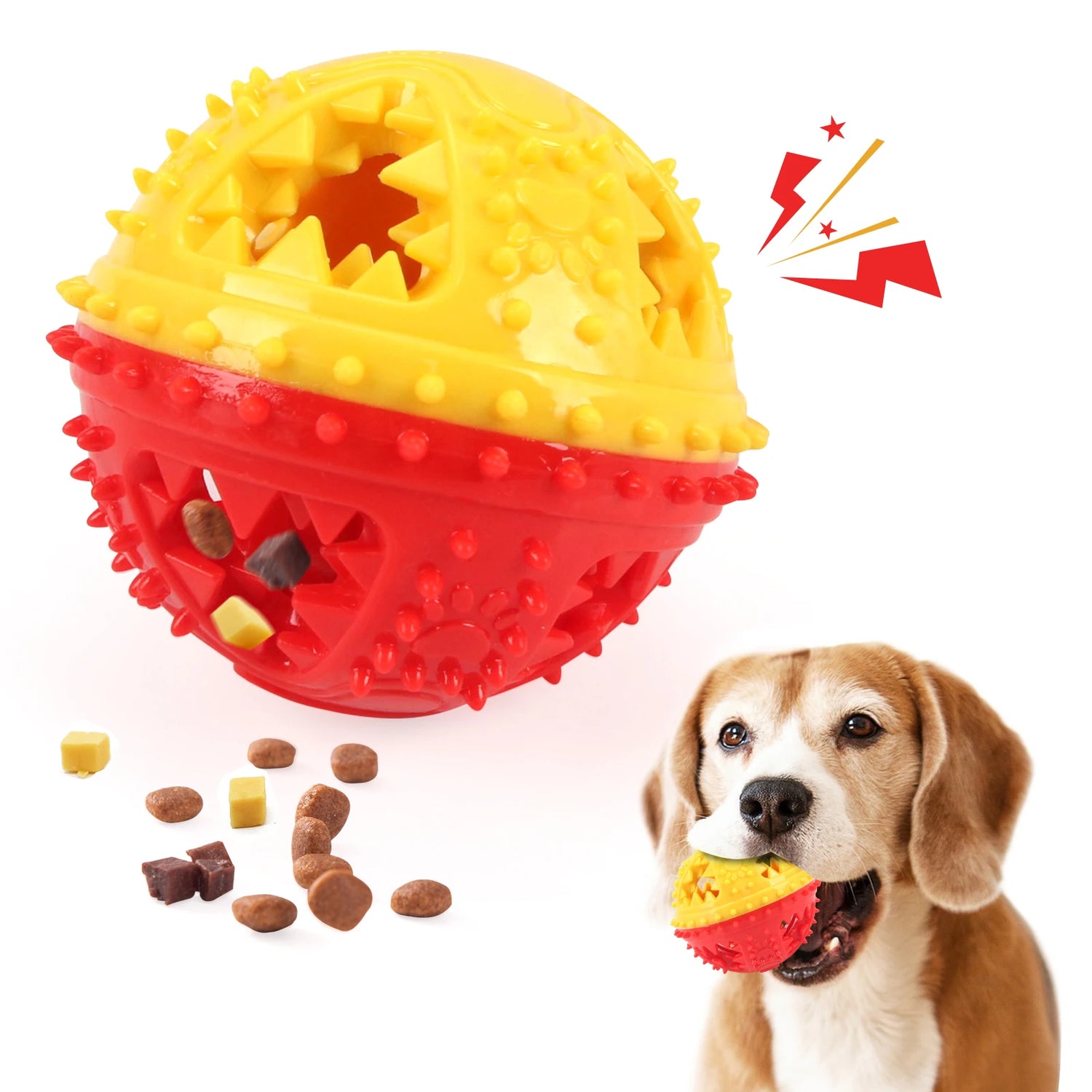 Dog with yellow and red interactive treat ball toy, spiked surface, scattered kibble.