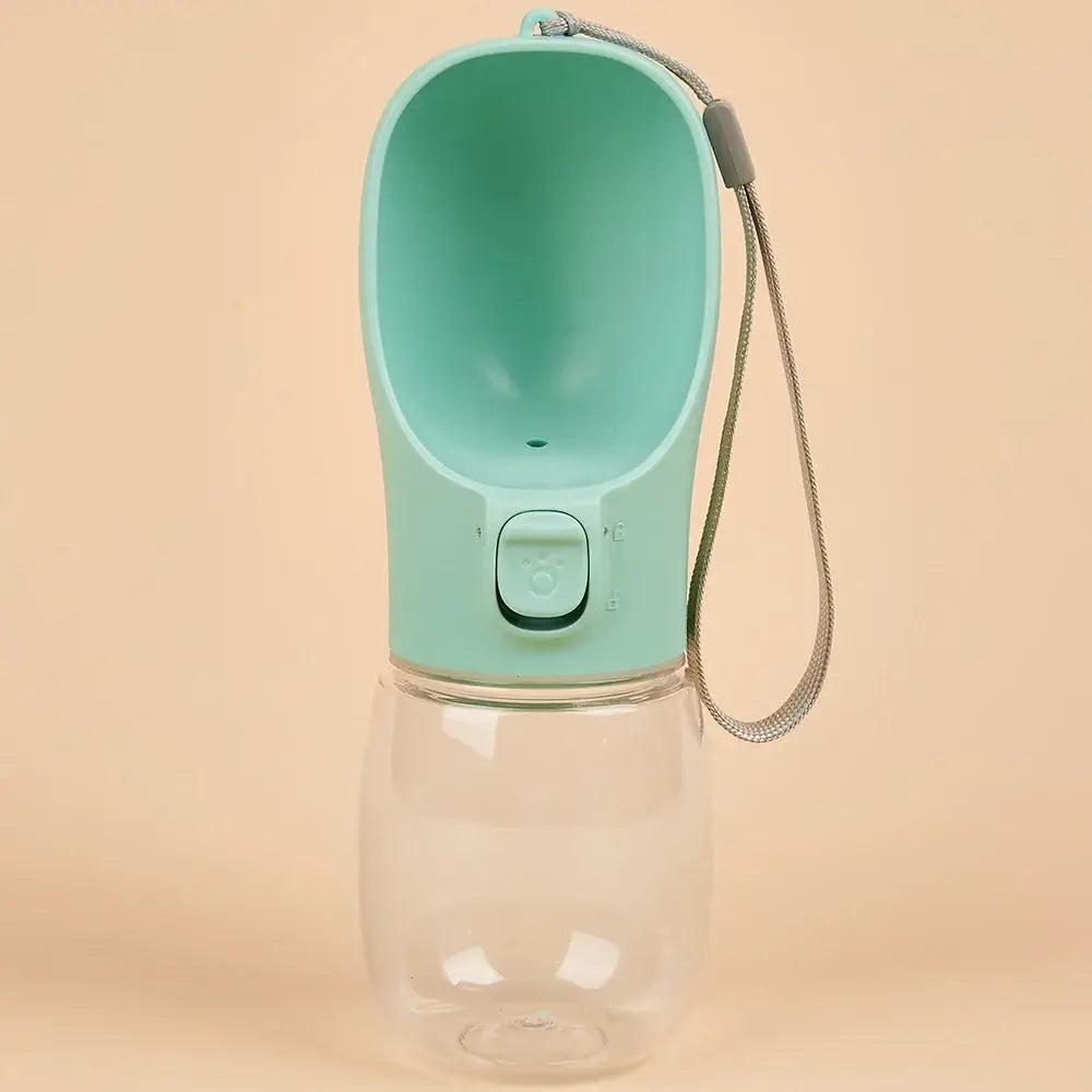 Portable dog water bottle for small and large pets, leakproof travel drinking bowl with wrist strap, turquoise