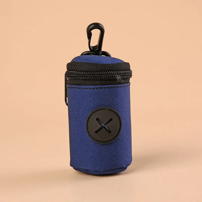 Blue dog waste bag dispenser with zipper and clip hook on beige background