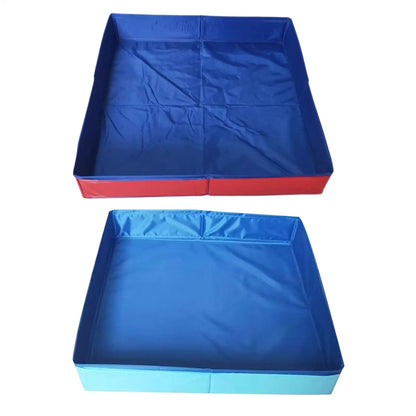 Two rectangular foldable dog pools, one with red sides and one with light blue sides