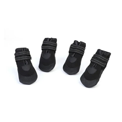 Adjustable waterproof dog boots set in black with anti-slip design and reflective straps for outdoor use.