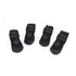 Adjustable waterproof dog boots set in black with anti-slip design and reflective straps for outdoor use.