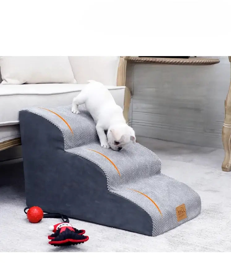 Small puppy using anti-slip dog stairs for small dogs to climb up to a couch.