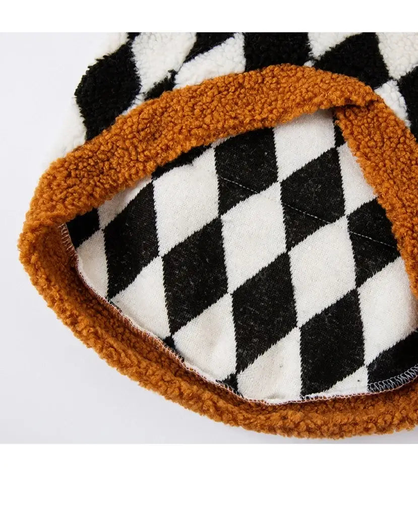 large dog fleece coat with black and white plaid pattern and warm brown trim for autumn and winter