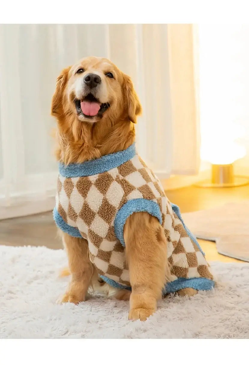 Golden Retriever wearing a large dog fleece coat with plaid diamond pattern for warm autumn and winter comfort