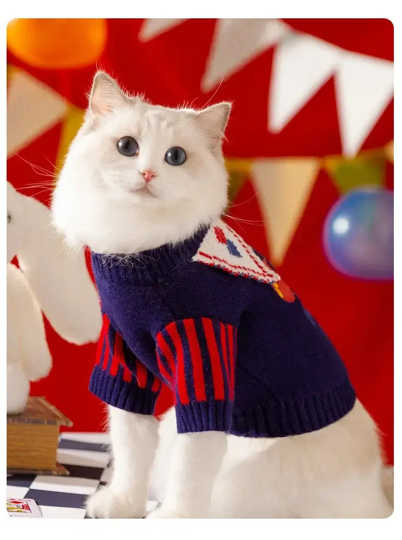 White cat wearing a plaid dog sweater with hat set, cozy winter pet clothing for small dogs and cats