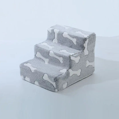 Dog safety ramp for medium dogs with a cozy grey design featuring bone shapes for easy access to furniture.