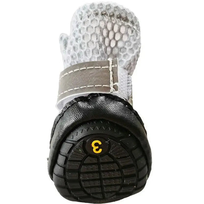Winter dog boots for small dogs featuring antiskid sole and waterproof design for enhanced paw protection.