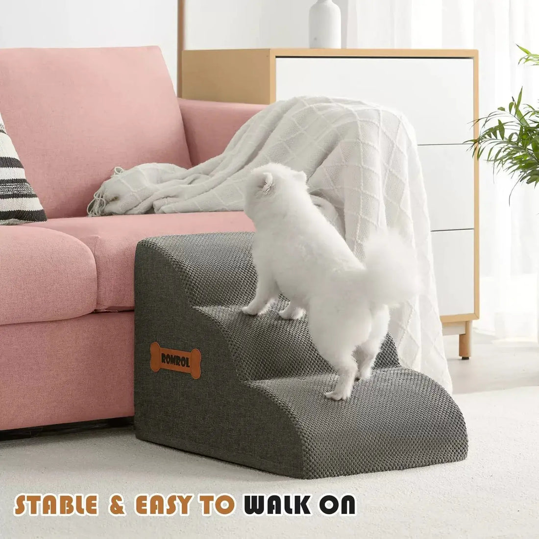 Dog safety ramp for elderly pets, allowing small dogs to easily access sofa with soft foam, cozy and stable design.