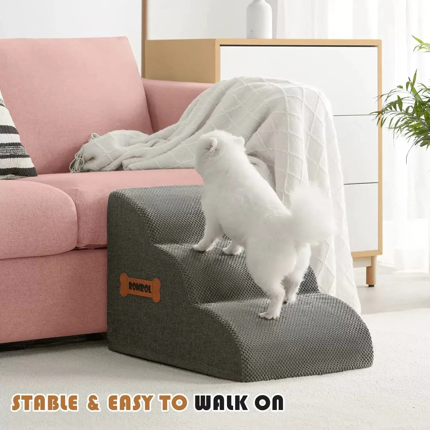 Dog safety ramp for elderly pets, allowing small dogs to easily access sofa with soft foam, cozy and stable design.