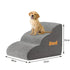dog safety ramp for elderly pets featuring soft foam staircase design with a puppy sitting on top, dimensions 55cm x 40cm x 35cm.