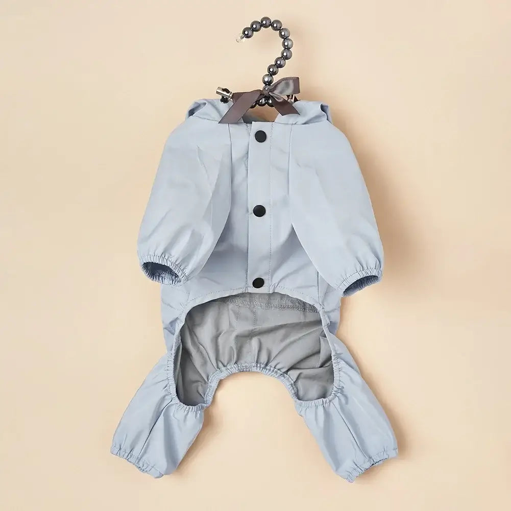 Light blue waterproof dog raincoat jumpsuit for small and medium dogs, hooded pet jacket with button closure