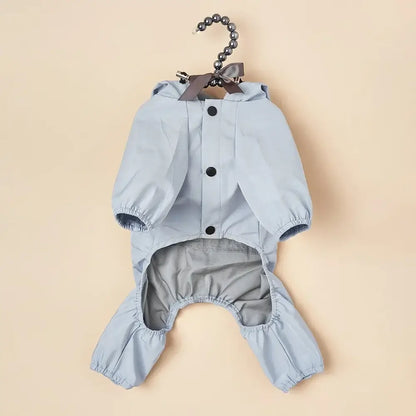 Light blue waterproof dog raincoat jumpsuit for small and medium dogs, hooded pet jacket with button closure