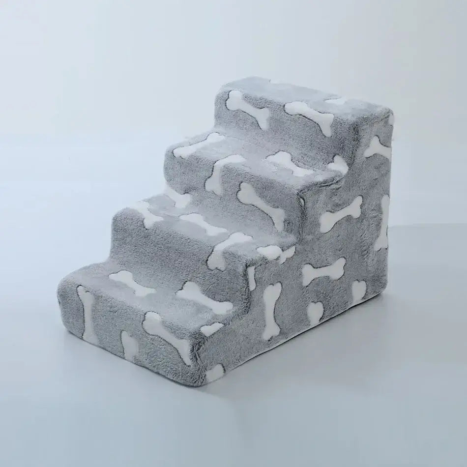 Dog safety ramp for medium dogs featuring soft, plush bone-patterned stairs for easy access beside the sofa.