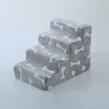 Dog safety ramp for medium dogs featuring soft, plush bone-patterned stairs for easy access beside the sofa.