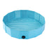 Folding dog pool in light blue with grid pattern, ideal for pets, made of wear-resistant PVC material.