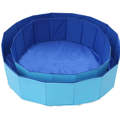 Foldable dog swimming pool in vibrant blue color, designed for pets and versatile use.