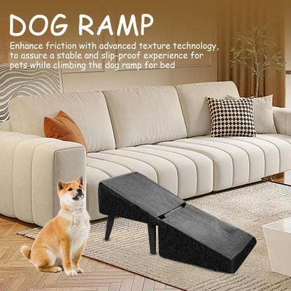 Foldable dog ramp for small breeds placed by a couch, designed for pets to climb safely and easily.