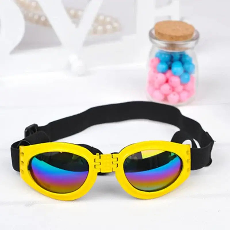 Yellow foldable dog sunglasses with black strap, windproof sunscreen pet goggles for puppies