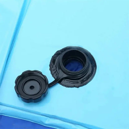 Close-up of the drain valve on a portable dog bathing tub, designed for easy water release and convenience.