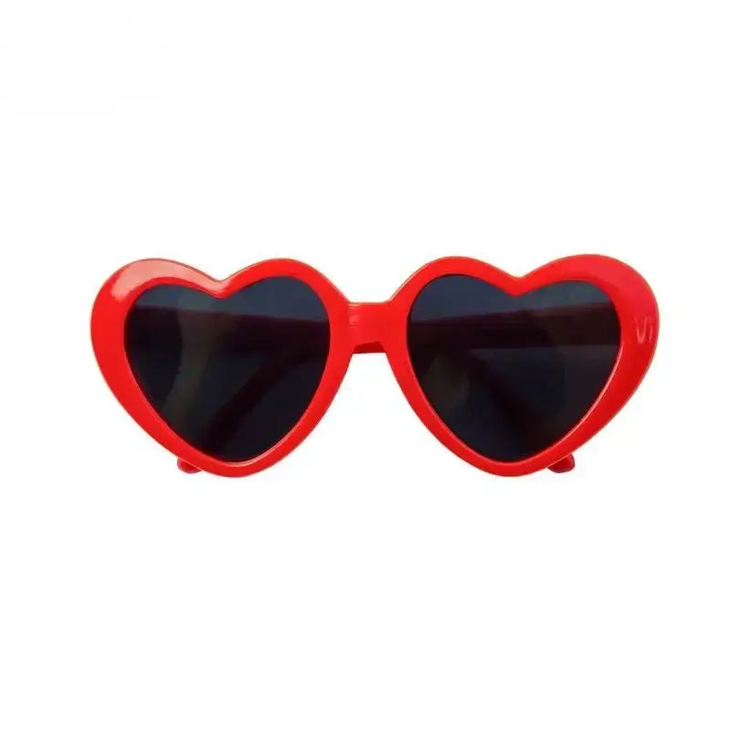 Red heart shaped dog glasses for pets, plastic sunglasses for summer parties and pet photos
