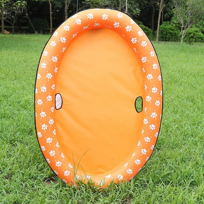 Inflatable dog swimming pool float in vibrant orange color with paw print design, perfect for pets to relax and enjoy summer.