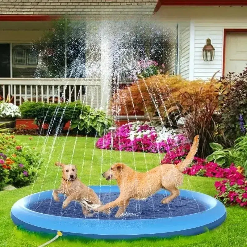 Two dogs playing in a Large Inflatable Dog Pool outdoor splash pad with a fountain in a colorful garden.