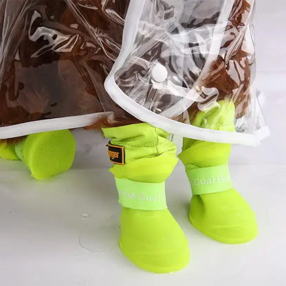 Waterproof dog rain boots in bright green, perfect for small and medium dogs, providing protection on rainy days.
