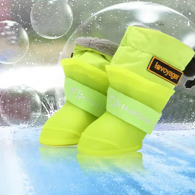 Waterproof dog rain boots in bright yellow for small and medium dogs, featuring antiskid and adjustable design.